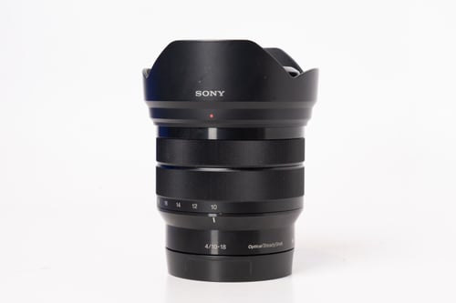 thumbnail-0 for Sony E 10-18mm F/4 OSS Lens w/ Hood, Box, and B+W UV