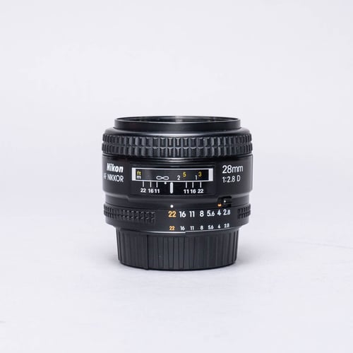 Nikon 28mm F/2.8D Lens w/ HN-2 Hood