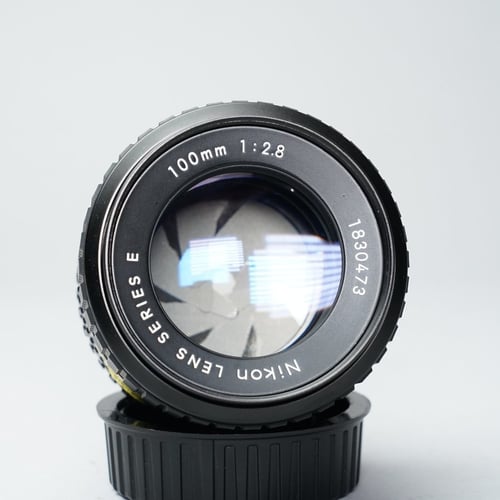 thumbnail-14 for Nikon Series E 100mm f/2.8 *oil on aperture*