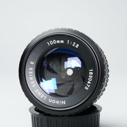 thumbnail-7 for Nikon Series E 100mm f/2.8 *oil on aperture*